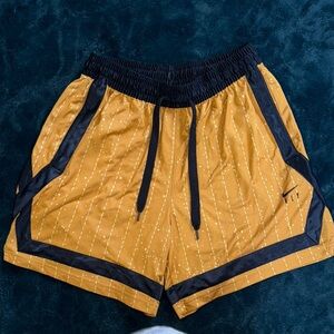 Nike Women's Athletic Shorts in Mustard and Black